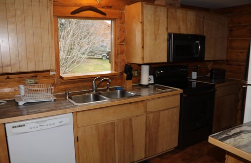 Anchor Point House | Unique Alaskan log home in trees & wild flowers on 14-acre private homestead.