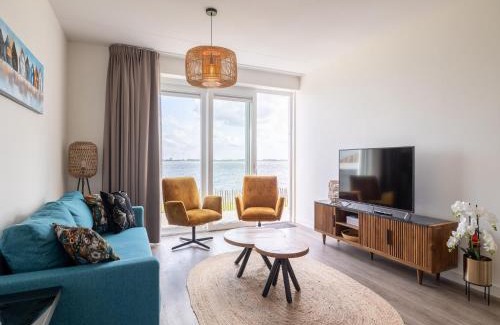 Sint-Annaland Apartment | Unique apartment, located on the Oosterschelde and marina of Sint Annaland