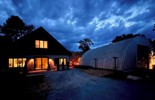 Alexander Cottage | Unique, earth sheltered country home with quonset hut access. Quiet! Pets!