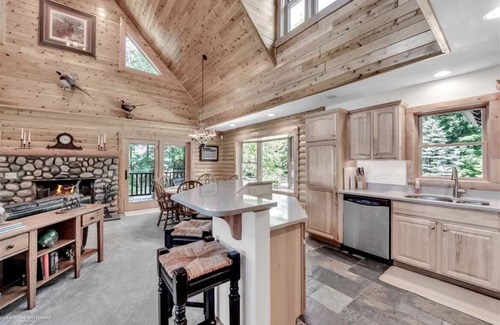 Long Lake House | Unique log cedar family vacation home with 185 feet of secluded lake frontage