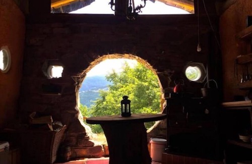 Villa Minozzo Cabin | Unique offgrid forest cabin, hand built using recycled materials.