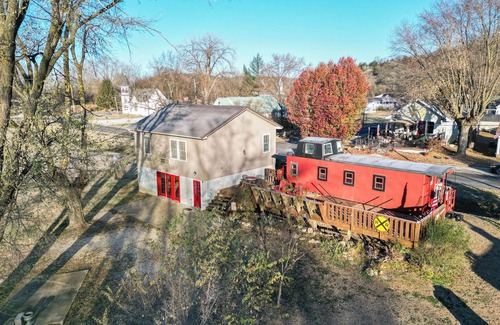 Hartsburg Cottage | Unique traincar stay at the Katy Caboose!