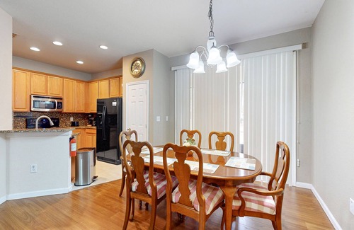 Trafalgar Village House | Updated retreat with pool access, W/D, AC, & patio - close to Disney Parks