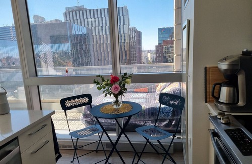 MIT Apartment | Upscale home with breathtaking view, full kitchen, living room and balcony