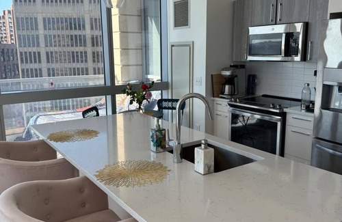 MIT Apartment | Upscale home with breathtaking view, full kitchen, living room and balcony