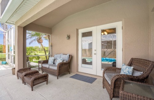 Buena Ventura Lakes House | Upstay - Waterside Home With Pool and Hot Tub