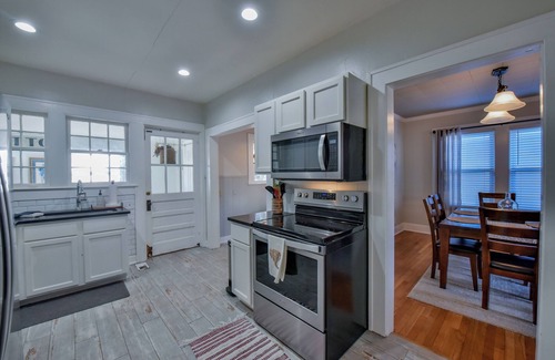 Forest Lake House | Uptown Charmer - Walk to shopping, restaurants, campus and more!