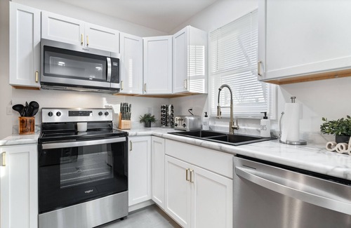Evansville House | Urban Oasis: A Charming Downtown Retreat with Game Room, Firepit and Yard Games