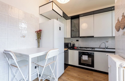 Milan Apartment | Urban Shelter with Balcony | Metro and Naviglio