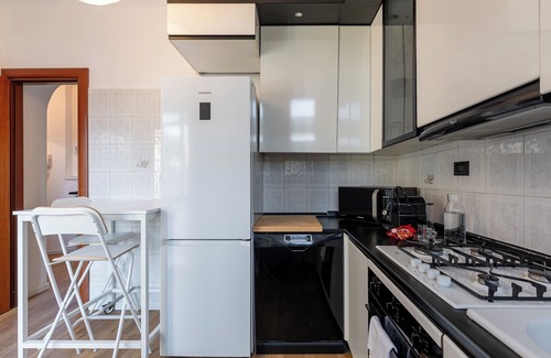 Milan Apartment | Urban Shelter with Balcony | Metro and Naviglio