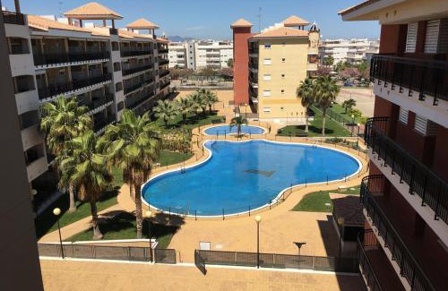 Canet de Berenguer Apartment | Urbanización Mar de Canet, 2 dormitorios con piscina comunitaria, garaje y wifi