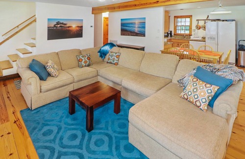 Chincoteague House | Utter East - great home with large screened porch and firepit next to the pond