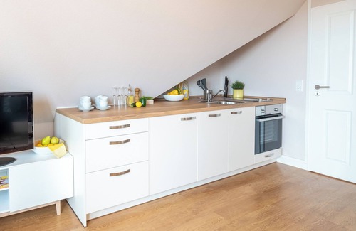 Cappel-Neufeld Apartment | Vacation apartment Hansekogge 4-18, picturesque and with sauna.