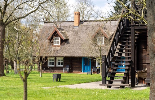 Kolonie Apartment | Vacation apartment Nachtigall - thatched plank house Zum Heuschober