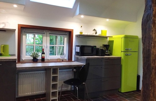 Westerstede Cottage | Vacation apartment "Kaminzimmer" in the 2-stall country house in the Rhodo garden.