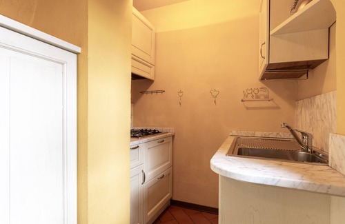 Barberino Tavarnelle House | Vacation Home "Antiche Mura" with Balcony, Shared Pool & Wi-Fi