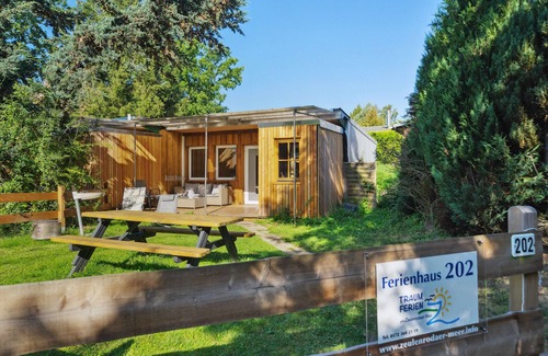 Bungalowdorf an der Talsperre House | Vacation home Seeblick Sauna use at the Zeulenrodaer Meer, enjoy nature and tranquility