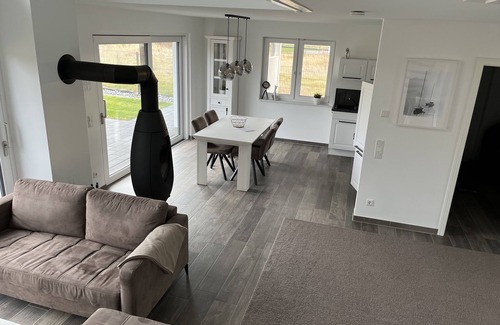 Lobnitz House | Vacation home Hilde on the lake with private beach for 4 adults, fireplace, boat and sauna