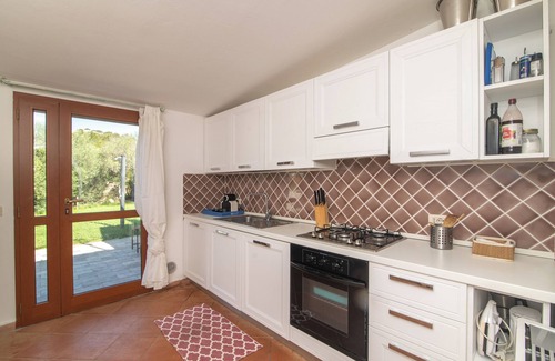 Baja Sardinia House | Vacation Home “Susy House” close to the Beach with Sea View and Garden