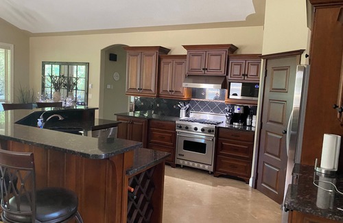 Parkland Beach House | Vacation oasis for the whole family! Private dock steps from your backyard