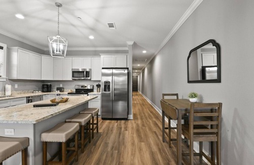 Long Beach Apartment | Vacation Rental Oasis in Downtown Long Beach - Your Gateway to Gulf Coast Bliss!