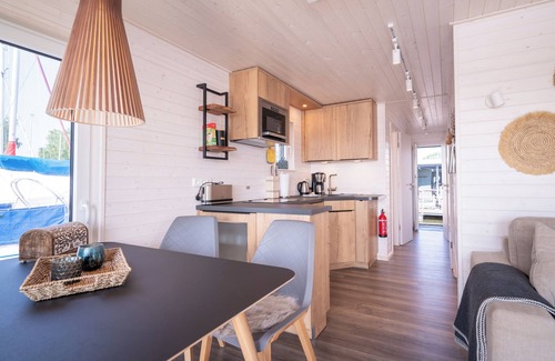 Fehmarnsund House | Vacations on a houseboat - pure relaxation for water and landlubbers alike!