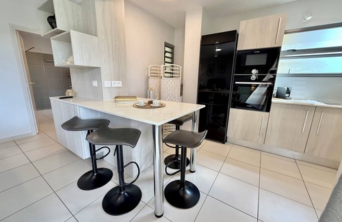 Papeete Condo | Vaiana City Apartment - relaxing downtown Papeete - garden view, A/C - WiFi