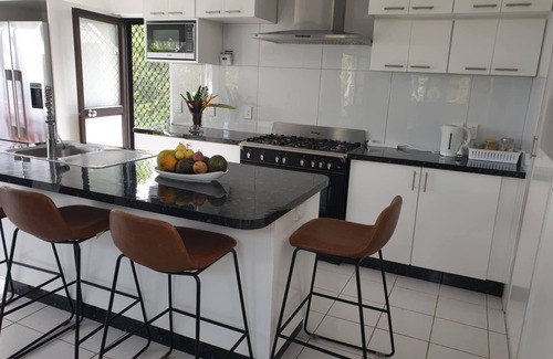 Rarotonga House | Vaniva's Villa nestled in a tropical garden oasis.