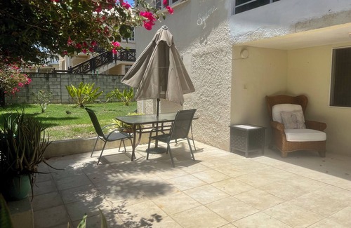Derricks Apartment | Very specious garden condo with a private patio