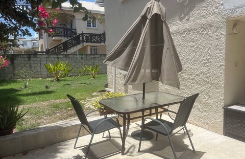 Derricks Apartment | Very specious garden condo with a private patio