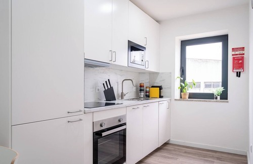 Sao Mamede de Infesta Apartment | Vibrant Urban Flat by HostWise