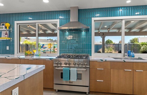 Village Grove House | Vibrant Updated MidCentury Home in OldTown-Htd Pool, Firepit, EV+ Garage, Office