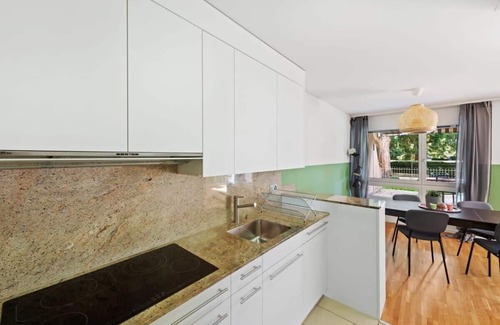 District 8 Apartment | Vibrant View: Sunlit Splendor