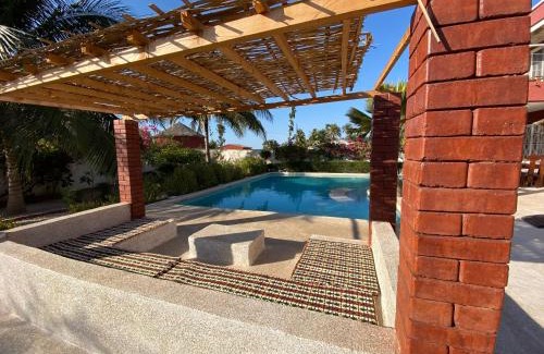 Palmarin Villa | Villa avec piscine entre plage et Siné Saloum