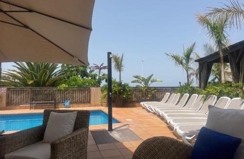 Puerto de Santiago Villa | VILLA BLOSSOM in the beautiful area of Puerto Santiago Tenerife with 5 bedrooms for up to 10 guests private swimming pool and many other activities to entertain the family Secure parking for 2 cars and disabled access throughout