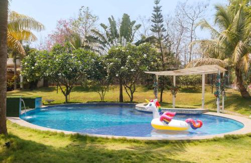 Alibaug Villa | Villa Capri by StayVista - Featuring a swimming pool, mountain view and snooker table