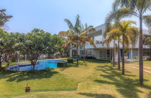 Alibaug Villa | Villa Capri by StayVista - Featuring a swimming pool, mountain view and snooker table