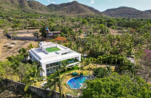 Alibaug Villa | Villa Capri by StayVista - Featuring a swimming pool, mountain view and snooker table