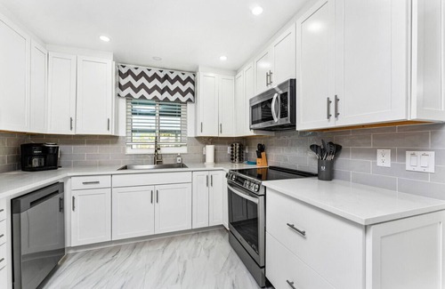 Punta Gorda House | Villa Capri | Waterfront Luxury Retreat Heated Saltwater Pool Dock