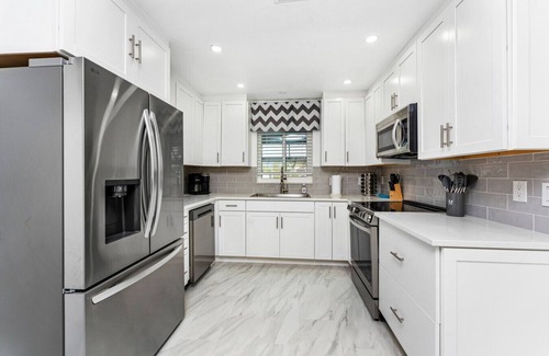 Punta Gorda House | Villa Capri | Waterfront Luxury Retreat Heated Saltwater Pool Dock
