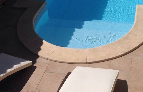 Pogliano Milanese Villa | Villa Le Tre Palme . Suite in relax . immersed in the green garden with swimming pool