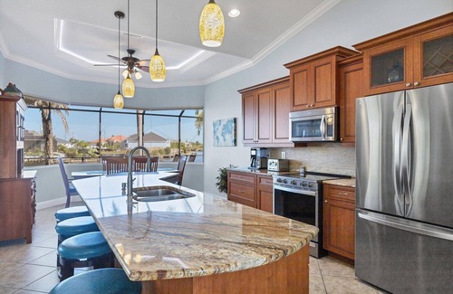 South Gulf Cove House | Villa Sol South Gulf Cove! Pool/Spa Waterfront Canal w Dock