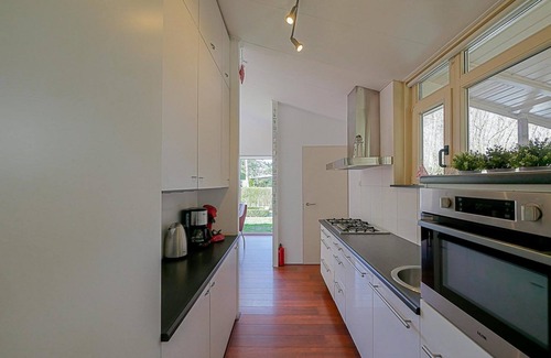 Julianadorp aan zee House | Villa Springtij: Spacious vacation home with private pool near the beach in Julianadorp aan Zee