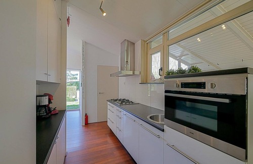 Julianadorp aan zee House | Villa Springtij: Spacious vacation home with private pool near the beach in Julianadorp aan Zee