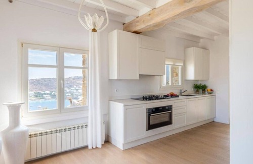 Ornos Villa | Villa TavaninStunning panoramic sea view magical sunsets, close to all hot spots