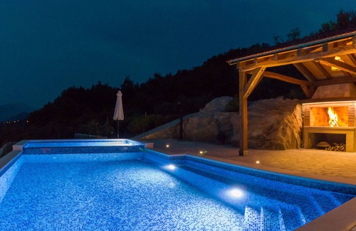 Zvecanje Villa | Villa with a view to nature, hydromassage heated pool, authentic stone property