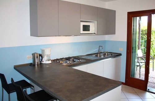 Lignano Pineta Villa | Villa with air conditioning, pool, terrace and garden