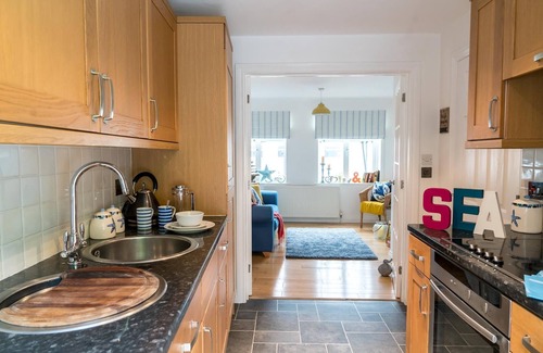 Shaldon House | Village property with parking and sunny enclosed courtyard garden