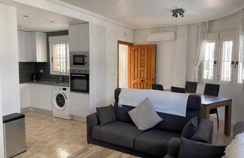 Orihuela Costa Villa | Villamartin Villa with Private Pool. 2 Min walk to Plaza. Lots of outdoor space.