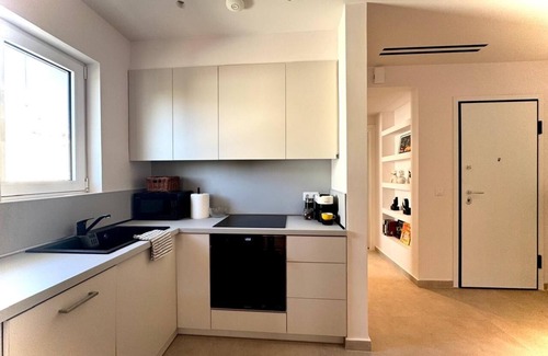 Voula Apartment | Voula ViewsnLuxury Apartment with Ocean Views – 100m from the Beach!